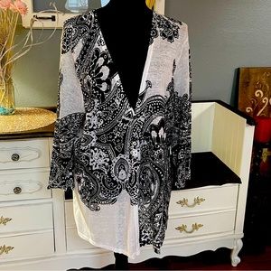 Chico’s white and black cardigan. Size 2
